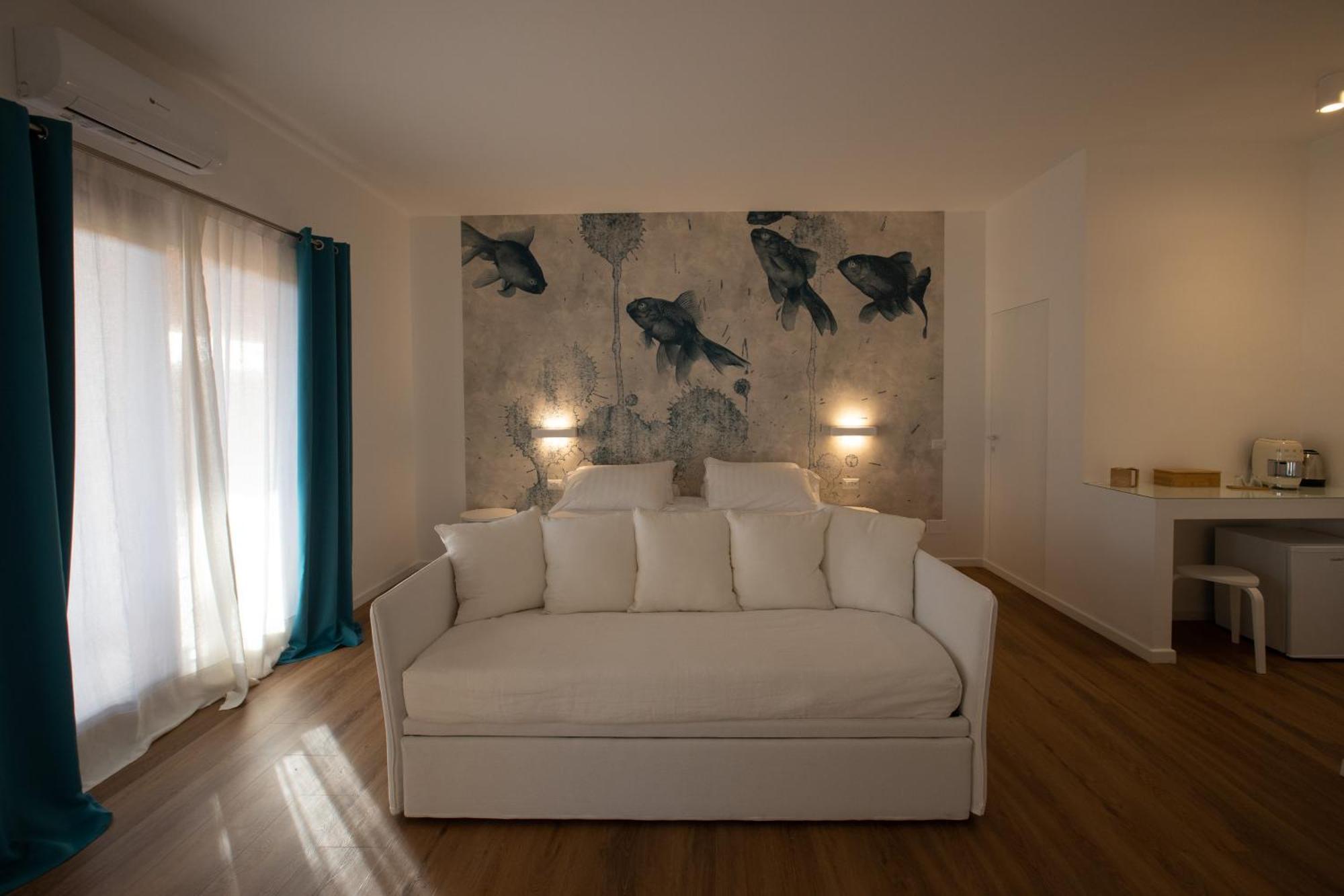Il Borgo Boutique Rooms By Kasavacanze Loiri Porto San Paolo Exterior foto